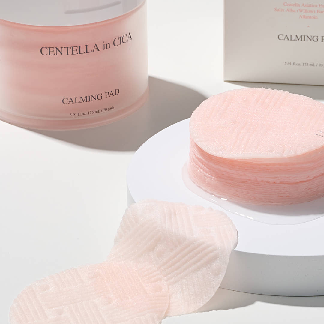 AND:AR Centellian in Cica Calming Pads 70 sheets displayed on a table, highlighting their gentle and soothing design.