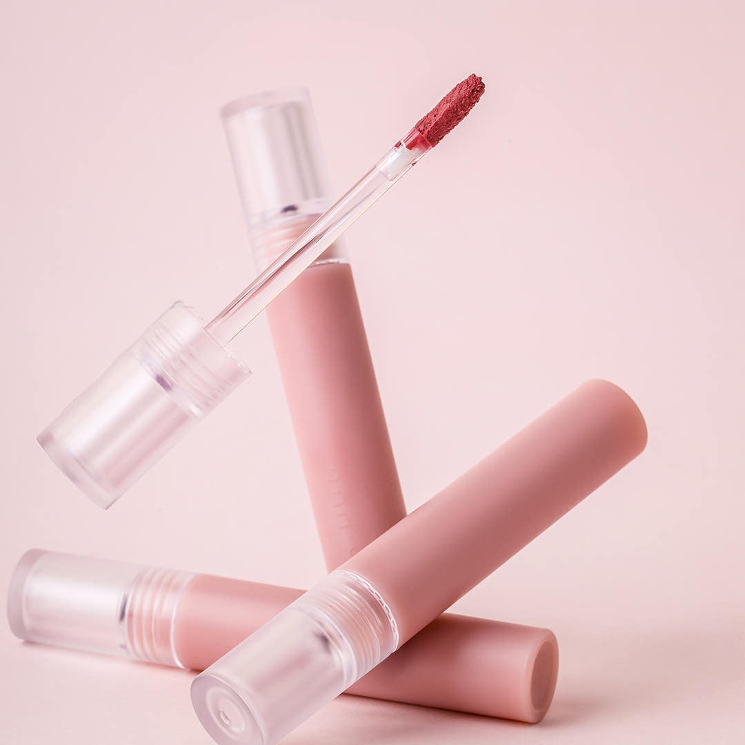 AND:AR Matte Lip Color in soft pink tone with applicator, perfect for long-lasting wear and vibrant color. Ideal for beauty enthusiasts.