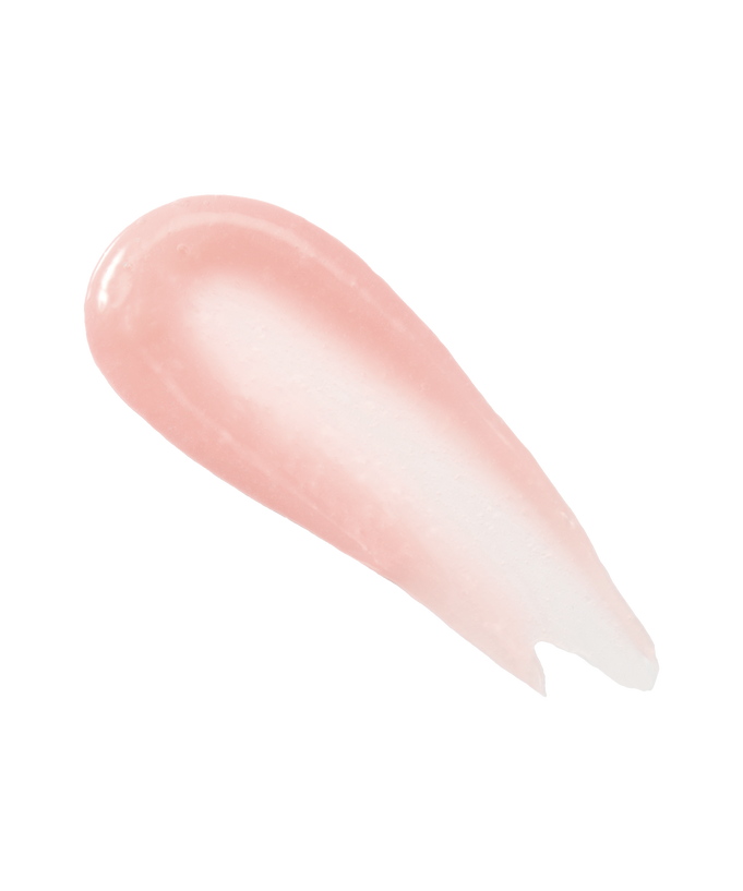 Swipe of ANILLO Mellow Glow Balm showing creamy texture and light pink hue for nourishing glow.