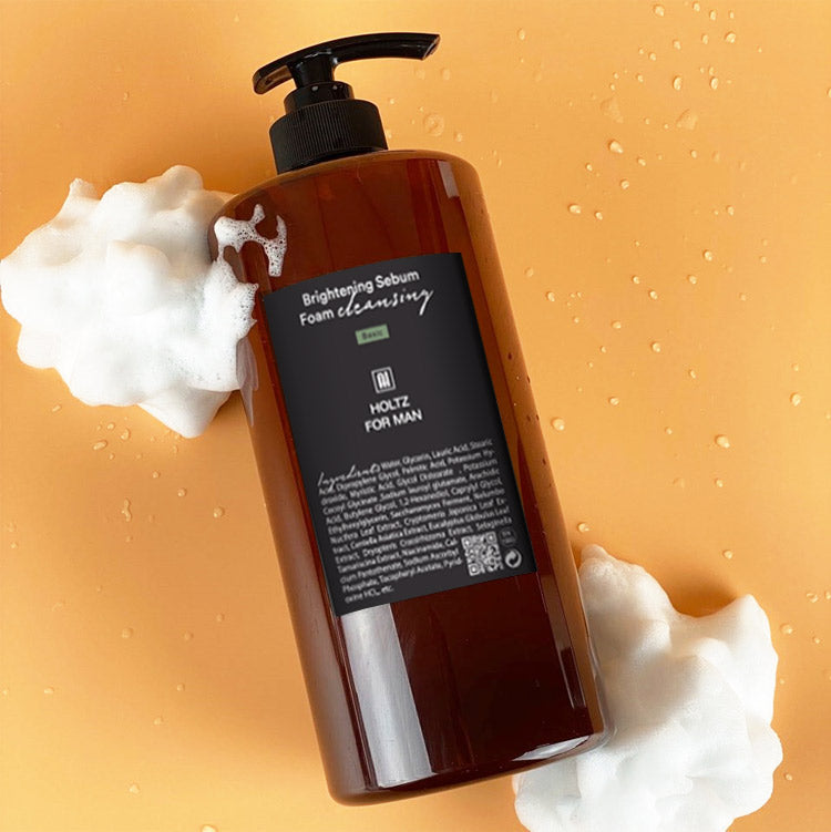 ANNA HOLTZ For Men Cleansing Foam 1000ml by Gentleman Korea – brown pump bottle with foam on orange background