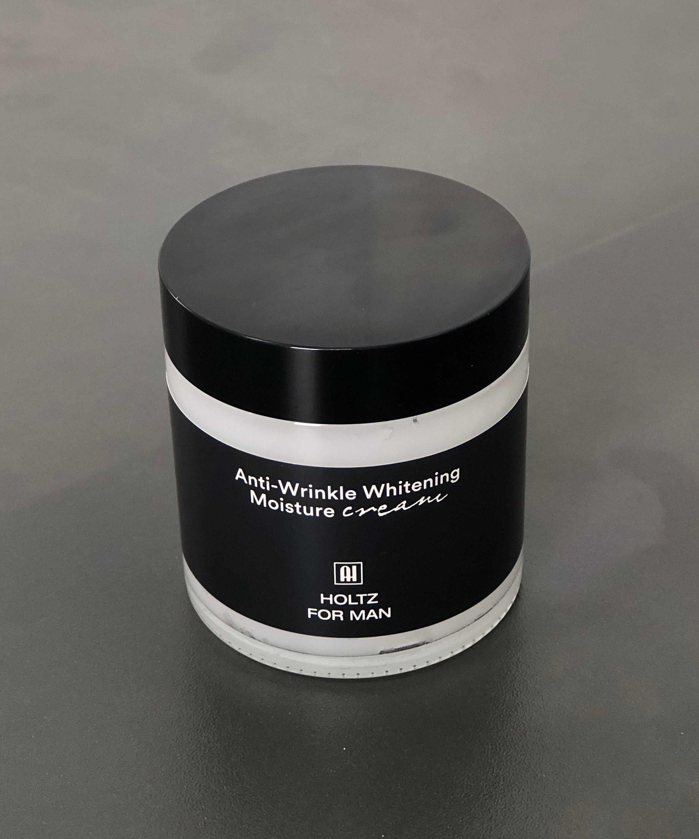 ANNA HOLTZ For Men Homme Snail Wrinkle Improving Whitening Moistureizing Cream 100ml - Gentleman Korea product shot of black jar