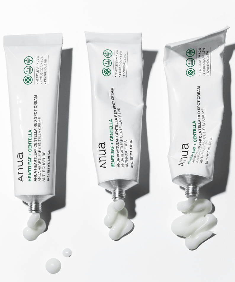 Tubes of ANUA Centella Red Spot Cream with Asungcho displayed with cream swatches