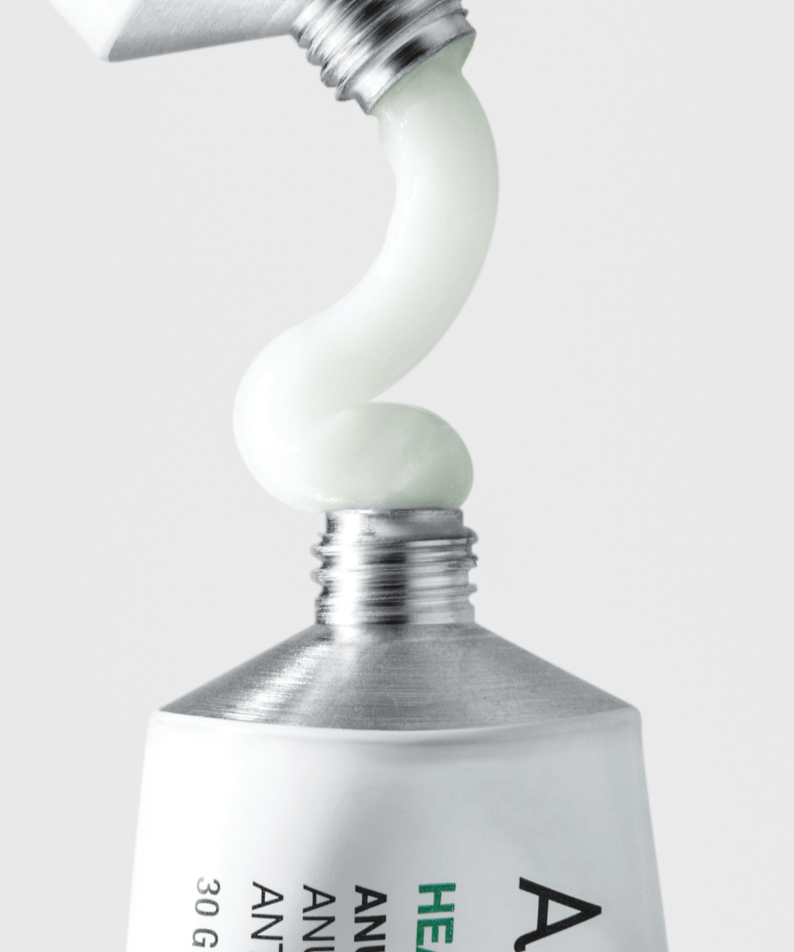 Close-up of ANUA Centella Red Spot Cream with Asungcho in a tube