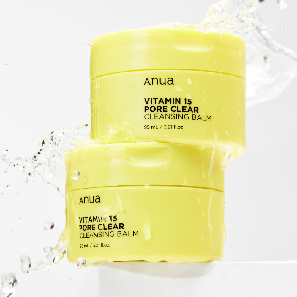 ANUA Vitamin 15 Pore Clear Cleansing Balm 95ml packaging with splashing water, showcasing skincare product's features.