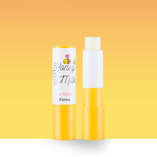 A'PIEU Honey&Milk Lip Balm in yellow tube, moisturizing lip care product with honey and milk formulation on a gradient background.