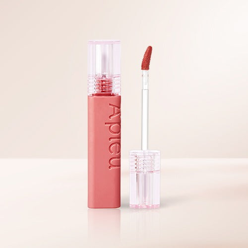 A'PIEU Juicy Pang Tint in elegant packaging showcasing vibrant lip tint color.