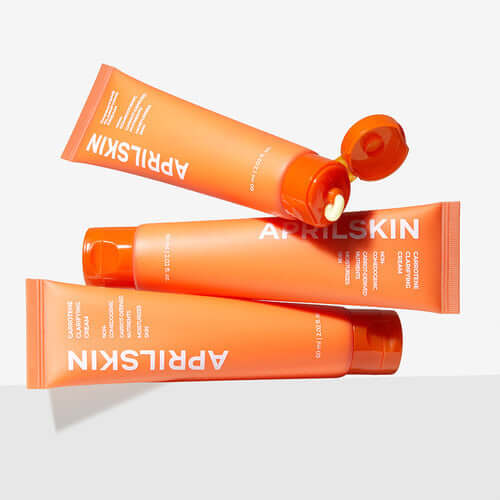 APRILSKIN Carrotene Clearifying Cream tubes displayed on a white surface