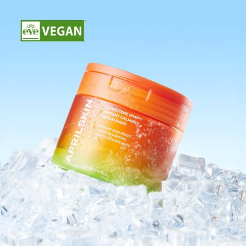 APRILSKIN Carrotene IPMP Inatant Calming Serum Pad on ice with eve vegan logo.