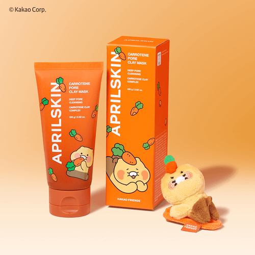 APRILSKIN Carrotene Pore Clay Mask with packaging and figurine on display.