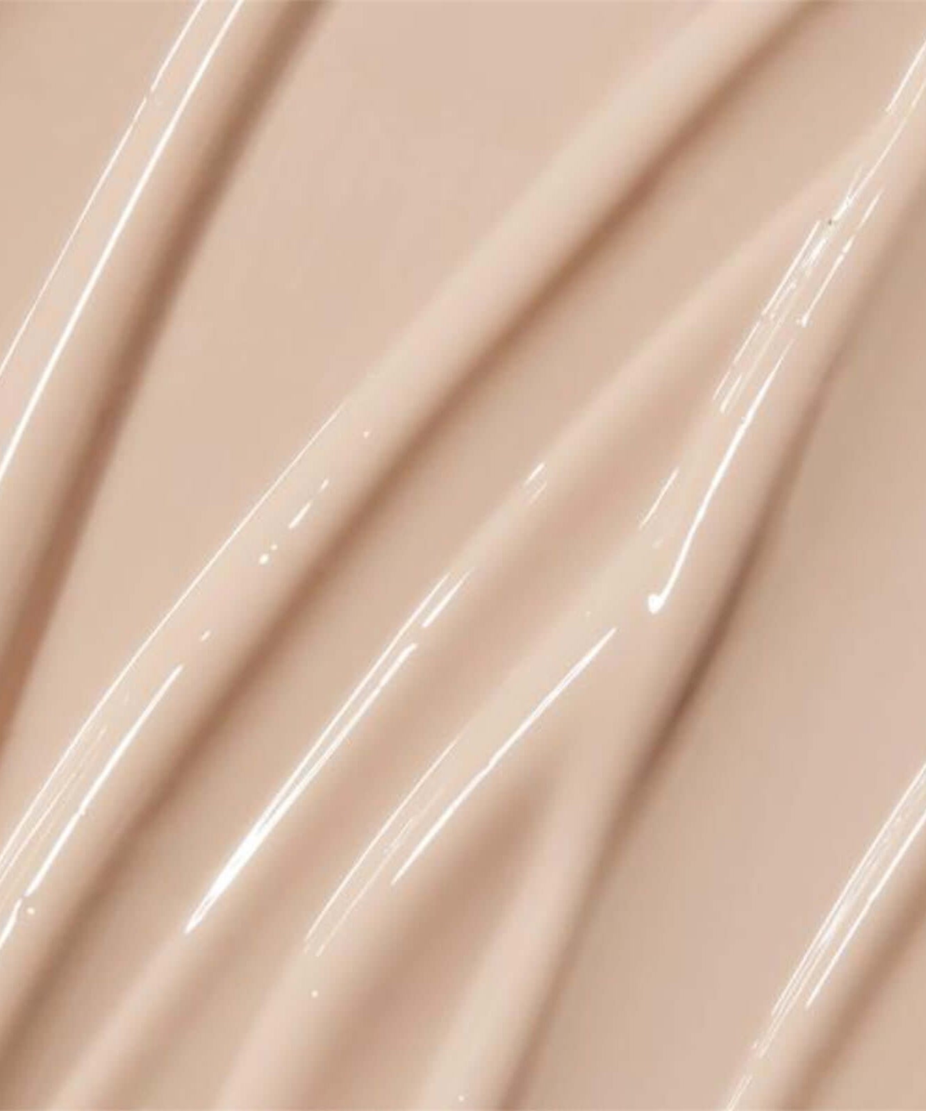 Close-up of APRILSKIN Tone-Up Skin Tint texture showcasing smooth, radiant finish.