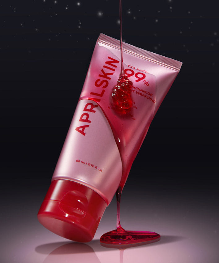 APRILSKIN TXA Niacinamide 99 Night Wrapping Mask 80ml tube with red liquid on a dark background.