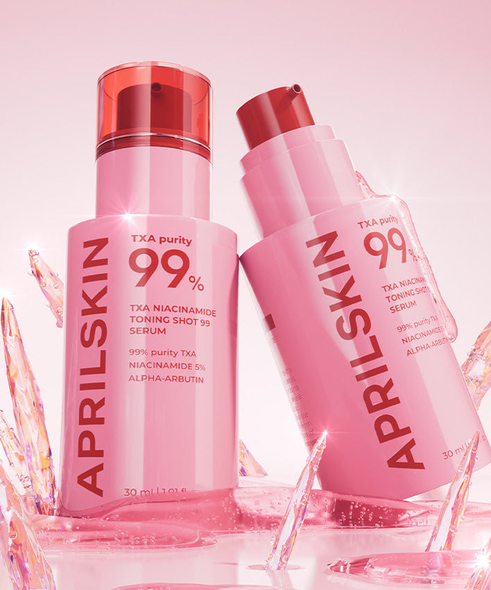Image of APRILSKIN TXA Niacinamide Toning Shot 99 Serum 30ml with crystal accents and pink background.