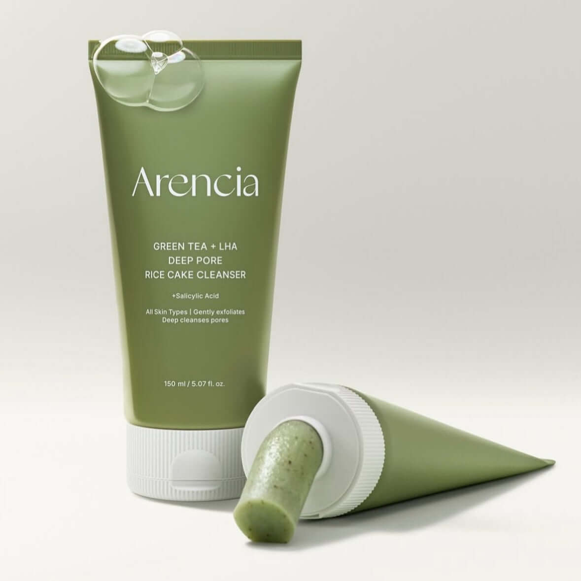ARENCIA Green Tea + LHA Deep Pore Rice Cake Soap 150ml product image showing green tube packaging on a light background