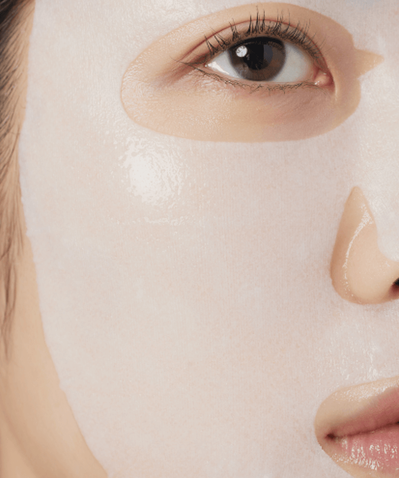 Close-up of a woman using ARENCIA Holy Hyssop Mask Pack (5 piece) for skincare