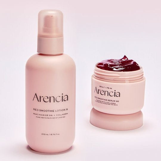 ARENCIA Red Smoothie Lotion 5 200ml bottle next to an open jar on a pink background