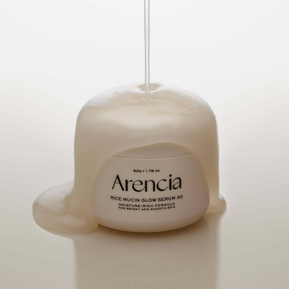 ARENCIA Rice Mucin Glow Serum 50g showcased with light serum texture for hydration and glow on skin.