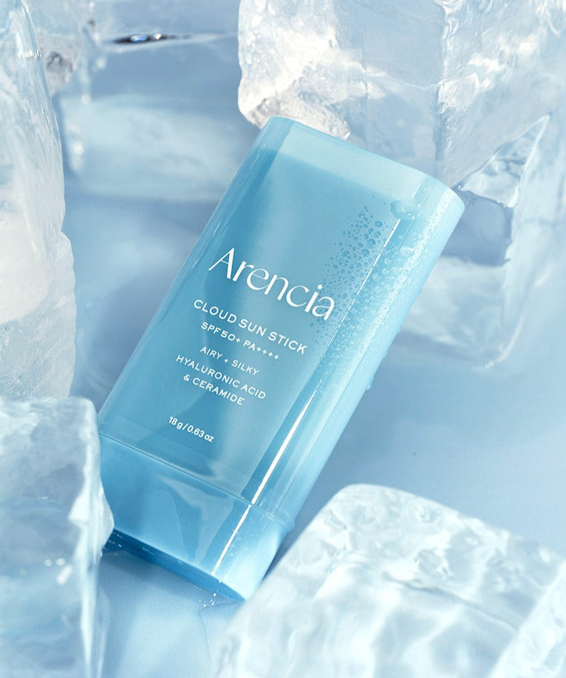 ARENCIA Cloud Sun Stick 18g surrounded by ice cubes, SPF 50+ with hydrating hyaluronic acid and ceramide.