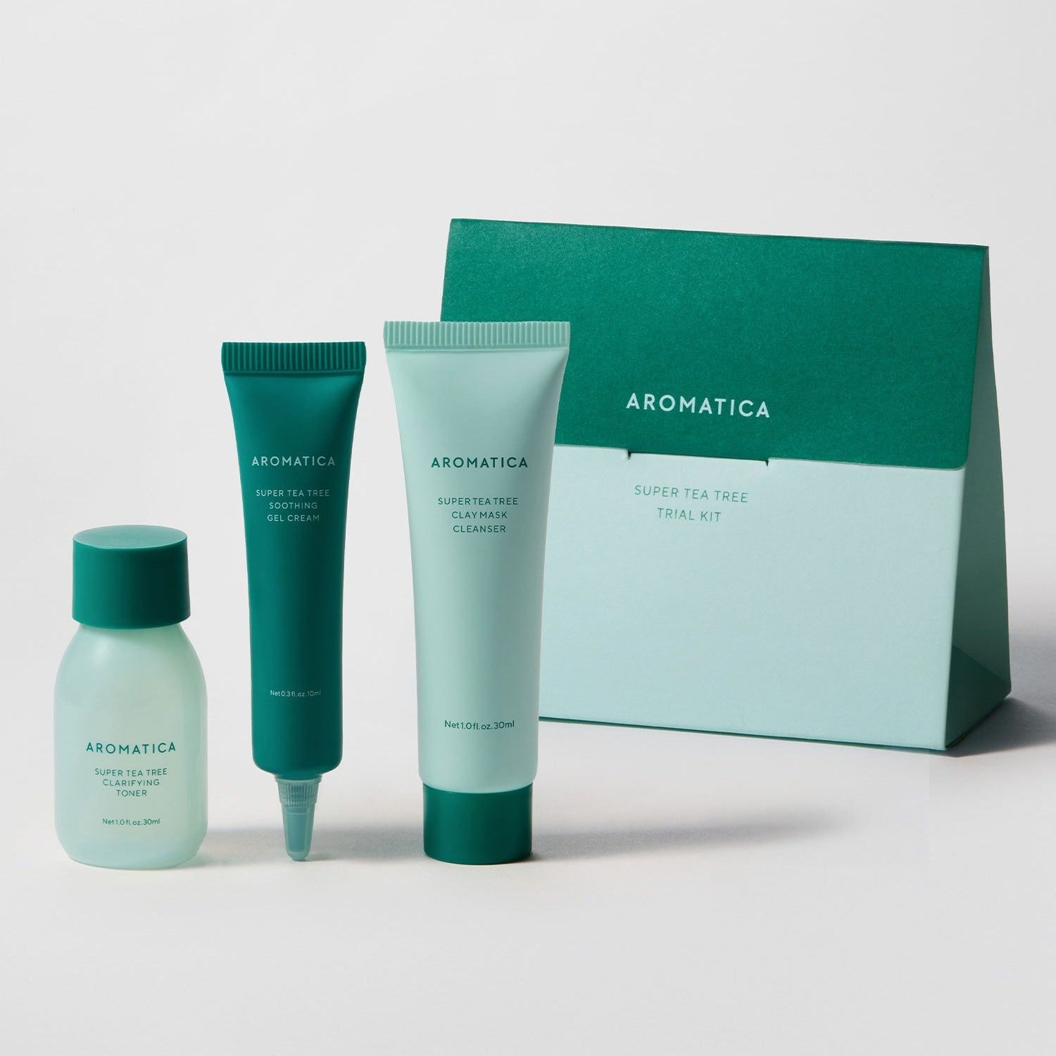 AROMATICA Super Tea Tree Trial Kit & Mini Essentials featuring skincare products and packaging.