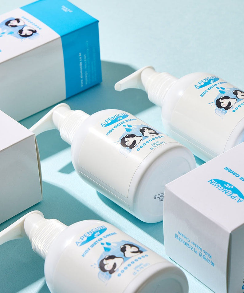 ATOMANDE Arctic Penguin Kids Children's Water Essence Moisture Cream Body Lotion 200ml packaging on display