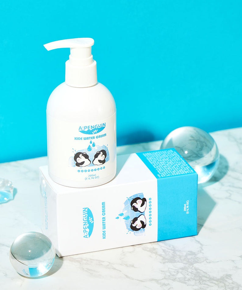 ATOMANDE Arctic Penguin Kids Children's Water Essence Moisture Cream Body Lotion 200ml on marble surface