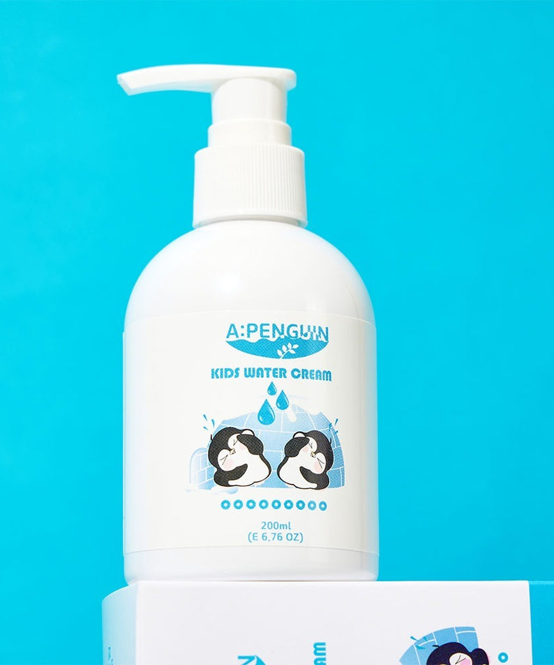 ATOMANDE Arctic Penguin Kids Children's Water Essence Moisture Cream Body Lotion 200ml bottle with blue background.