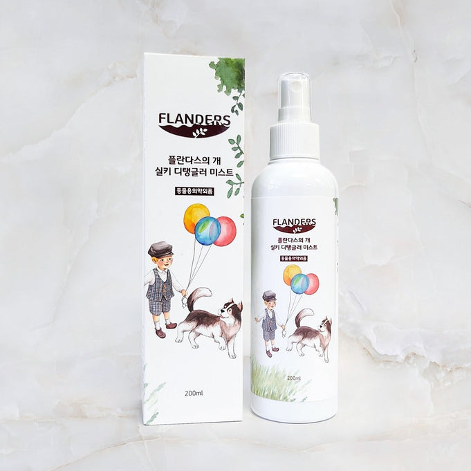 ATOMANDE Flander's Dog Silky Detangler Mist 200ml bottle and packaging on a marble surface