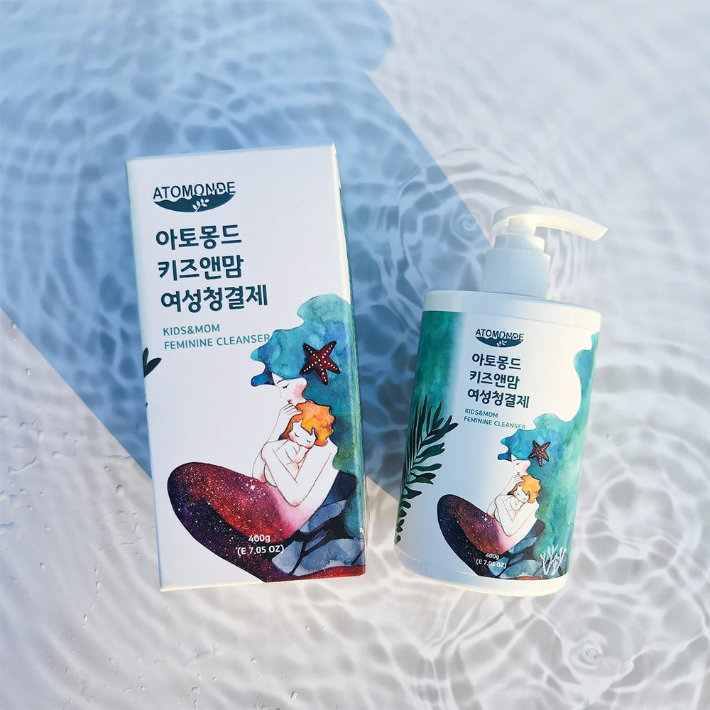 ATOMANDE Kids & Mom Feminine Cleanser 400g bottle and packaging on a textured background