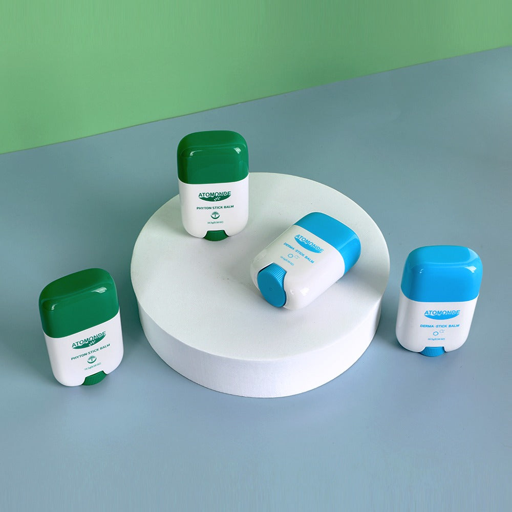 ATOMANDE Phyton Stick Balm 16.5g 1ea shown on display against a green background
