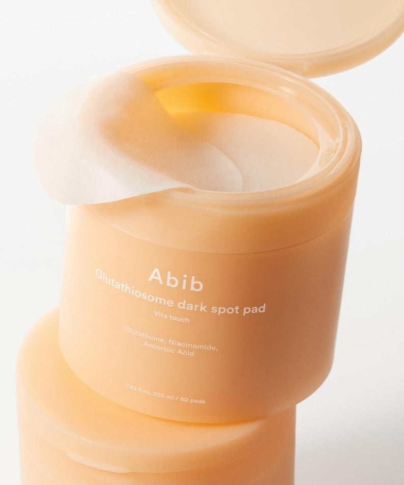 ABIB Glutathiosome Dark Spot Pad Vita Touch 60 EA jar with open lid and pads visible