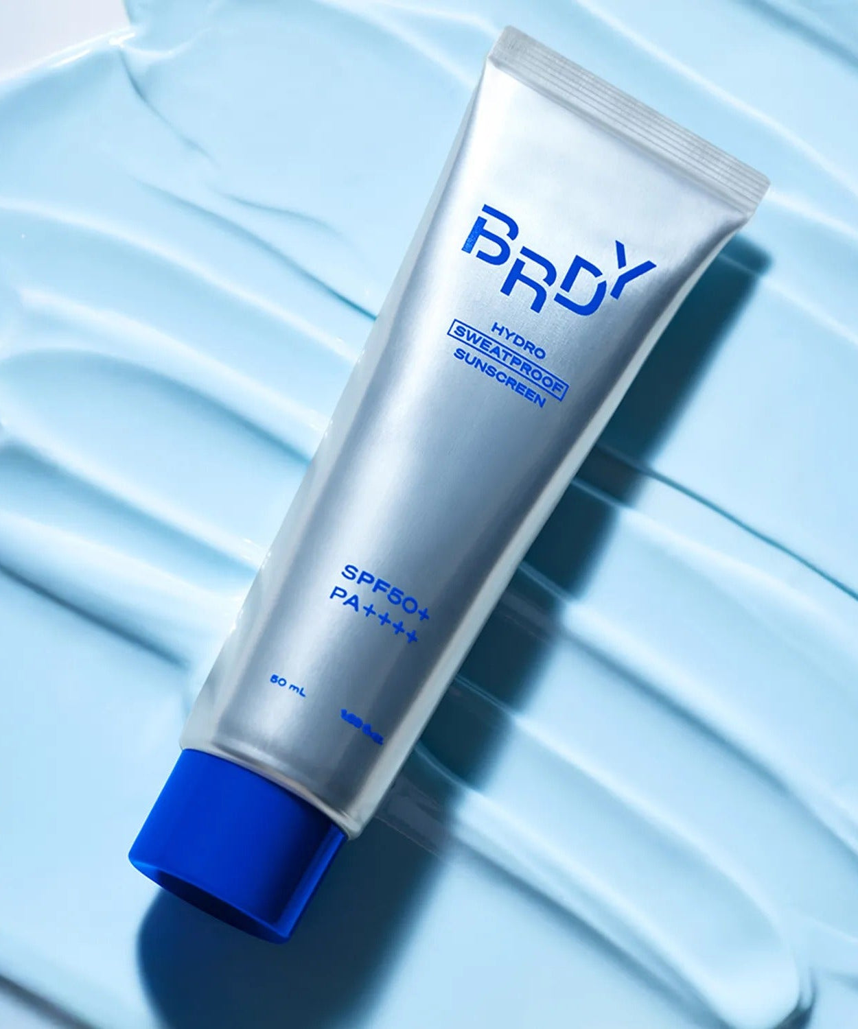 B.READY Hydro Sweatproof Sunscreen 50ml SPF50+ PA++++ tube on light blue background