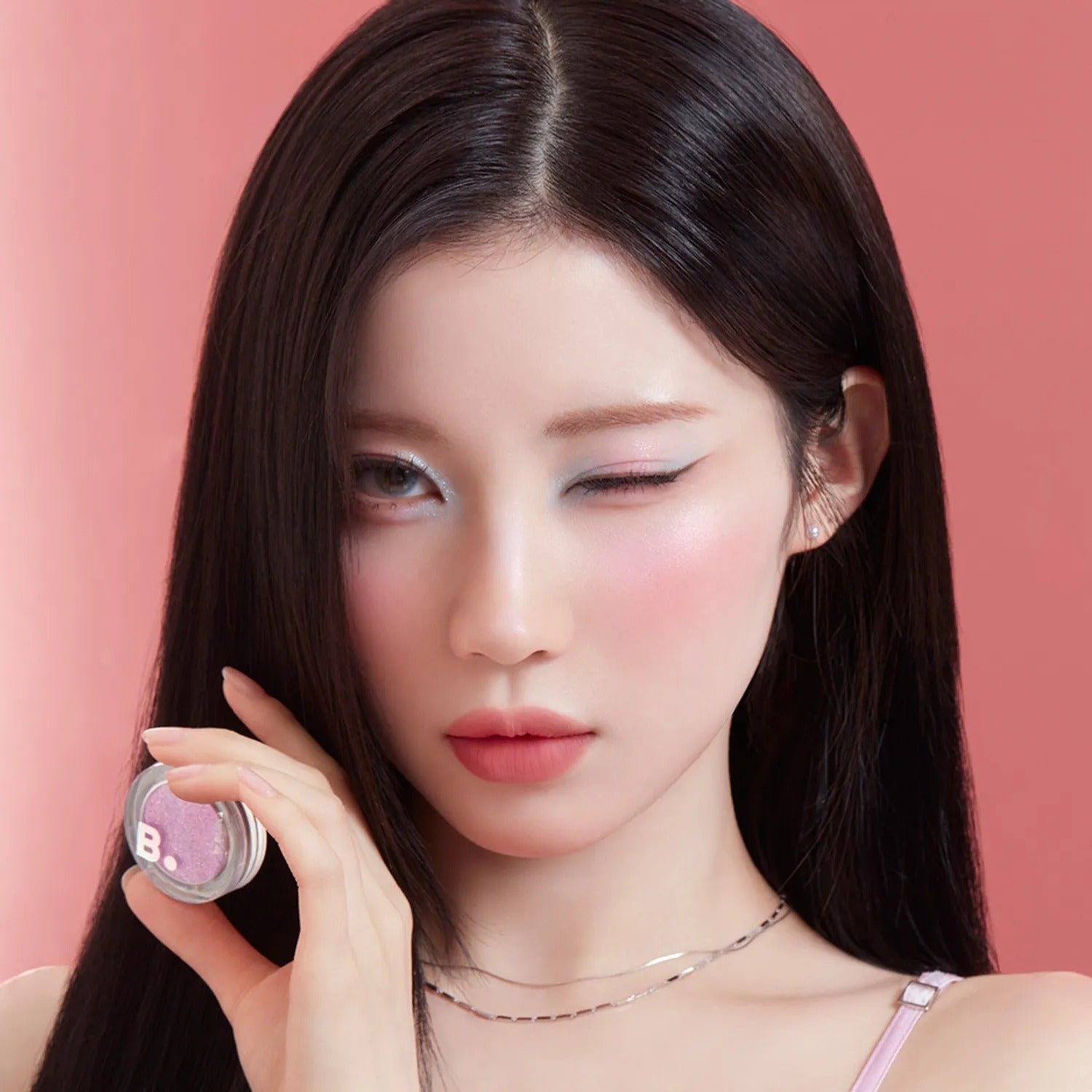 BANILACO Hyper Holobeam Eye Glitter on model with soft makeup look, highlighting eye shimmer and glossy finish for a sparkling effect.