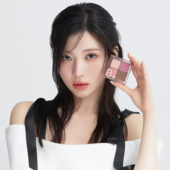 Model holding BANILACO Mood On Eye Palette showcasing colors
