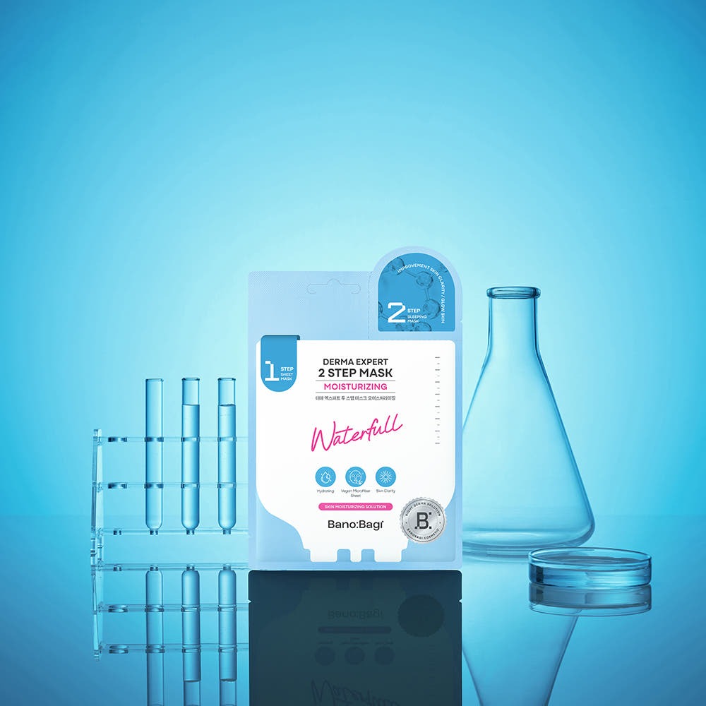 Image of BANOBAGI Derma Expert 2 Step Mask Moiturizing with laboratory glassware on a blue background