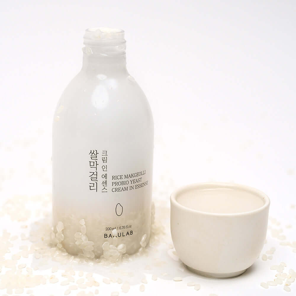 BARULAB Rice Makgeolli Probiotic Yeast Cream in Essence 200ml bottle with cup and scattered rice
