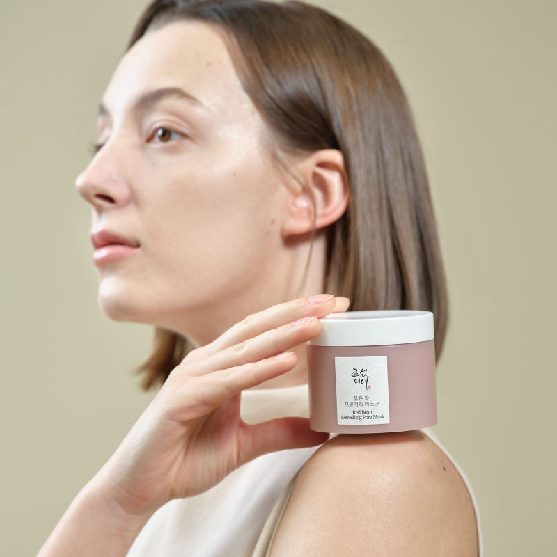 Woman holding BEAUTY OF JOSEON Red Bean Refrshing Pore Mask 140ml