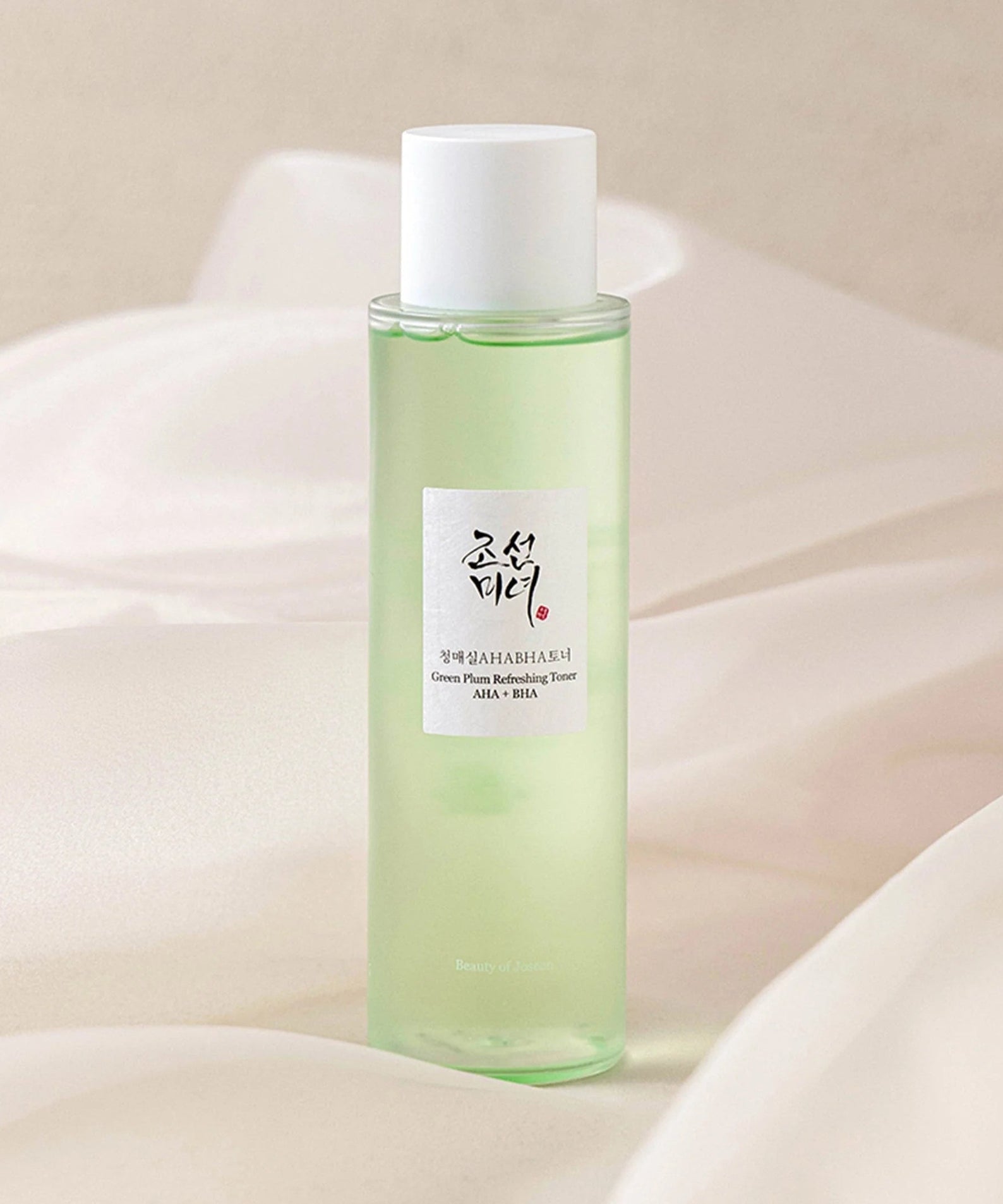BEAUTY OF JOSEON Green Plum Refreshing Toner AHA + BHA 150ml in a light green bottle on a soft background.