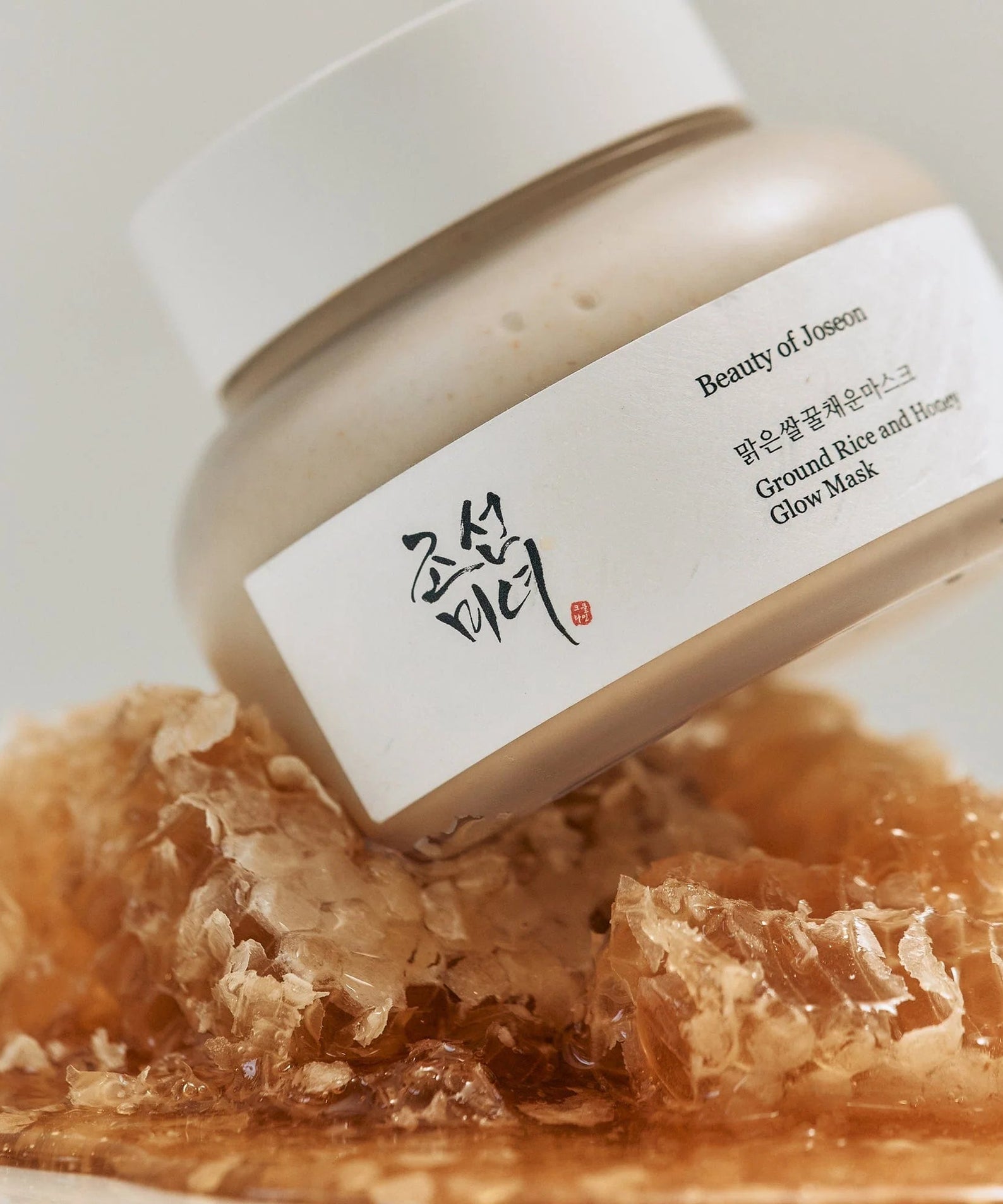 BEAUTY OF JOSEON Ground Rice and Honey Glow Mask 150ml with honeycomb showcasing luxurious skincare product.