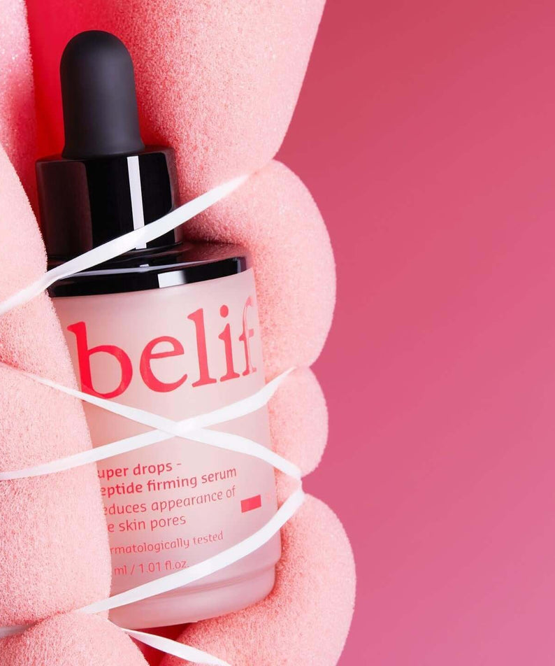BELIF Super Drops Peptide Firming Serum 30ml in pink packaging, highlighting firming properties.