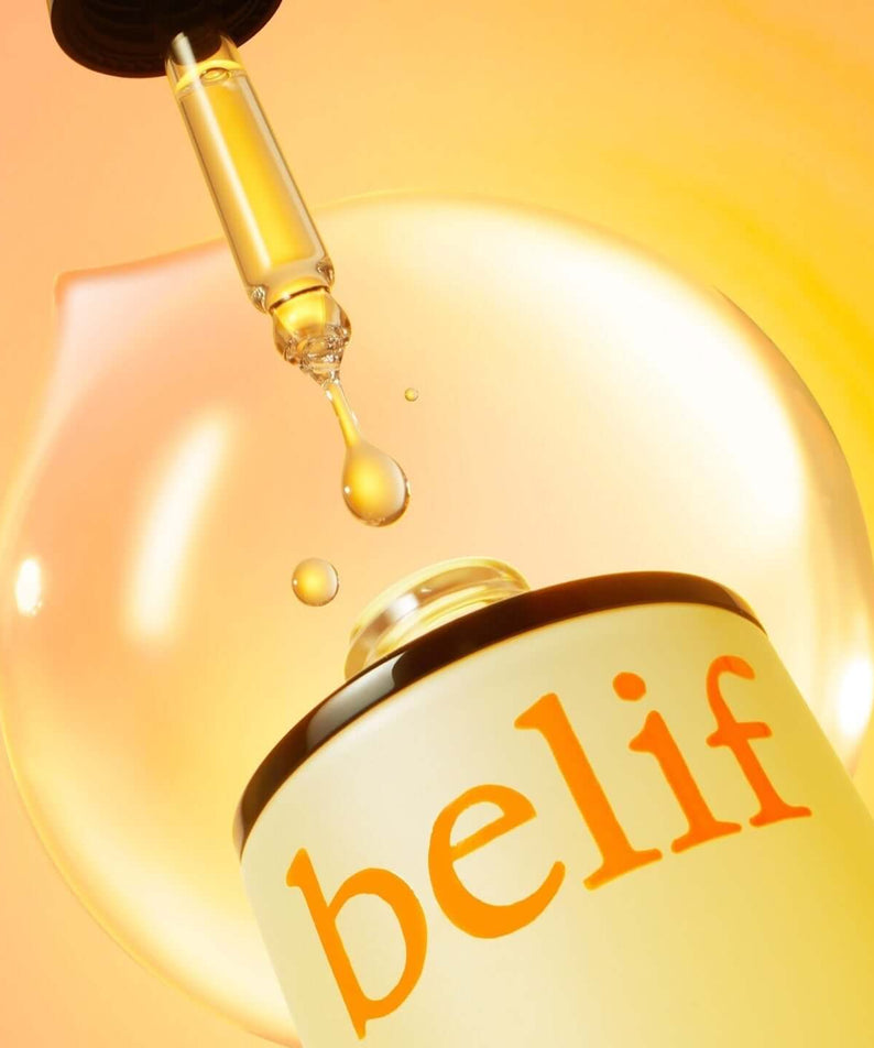 BELIF Super Drops Vita C Toning Serum 30ml bottle with dropper and vibrant background, showcasing skincare product.