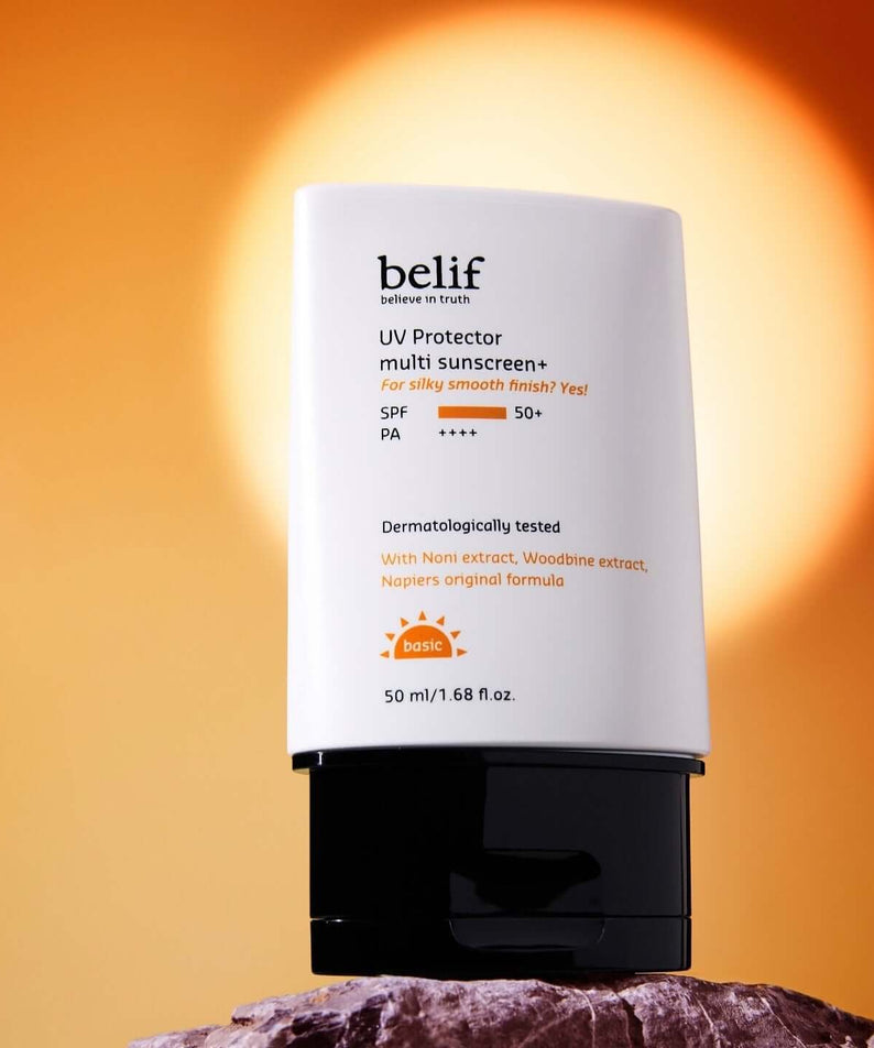 BELIF UV Protector Multi Sunscreen Plus 50ml with SPF50 in front of a vibrant sunny background