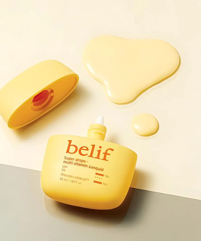 BELIF Super Drops Multivitamin Sunquid 50ml bottle with open cap and liquid next to it on a light background.