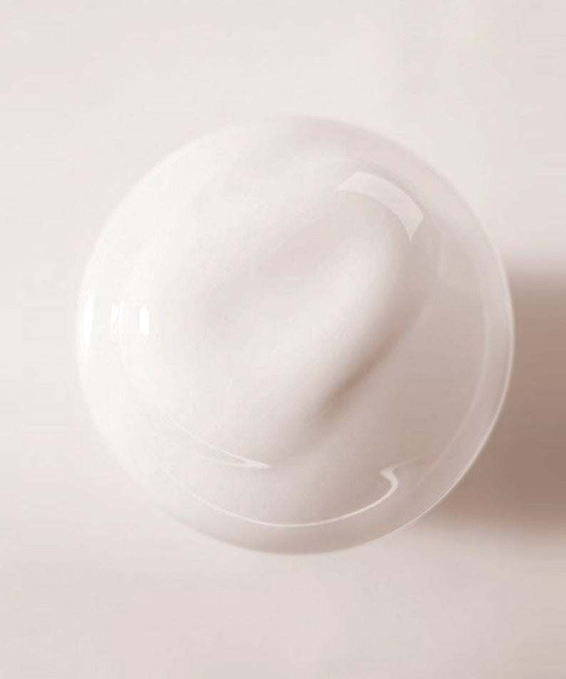 Top view of BELLBOY STUDIO Silky Shiloh Prime Conditioner 400ml showcasing creamy texture on a white background.