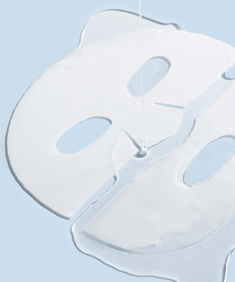 Close-up of BENTON Hydrogel Collagen Mask Pack 27g x4 showing transparent mask texture on a light blue background.