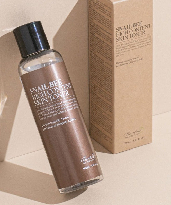 BENTON Snail Bee High Content Skin Toner 150ml with packaging on beige background