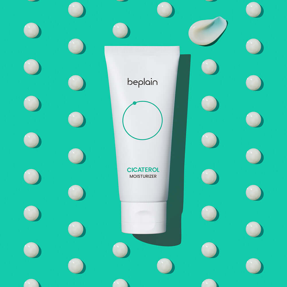 BEPLAIN Cicaterol Cream tube on teal background with white dots and cream swatch