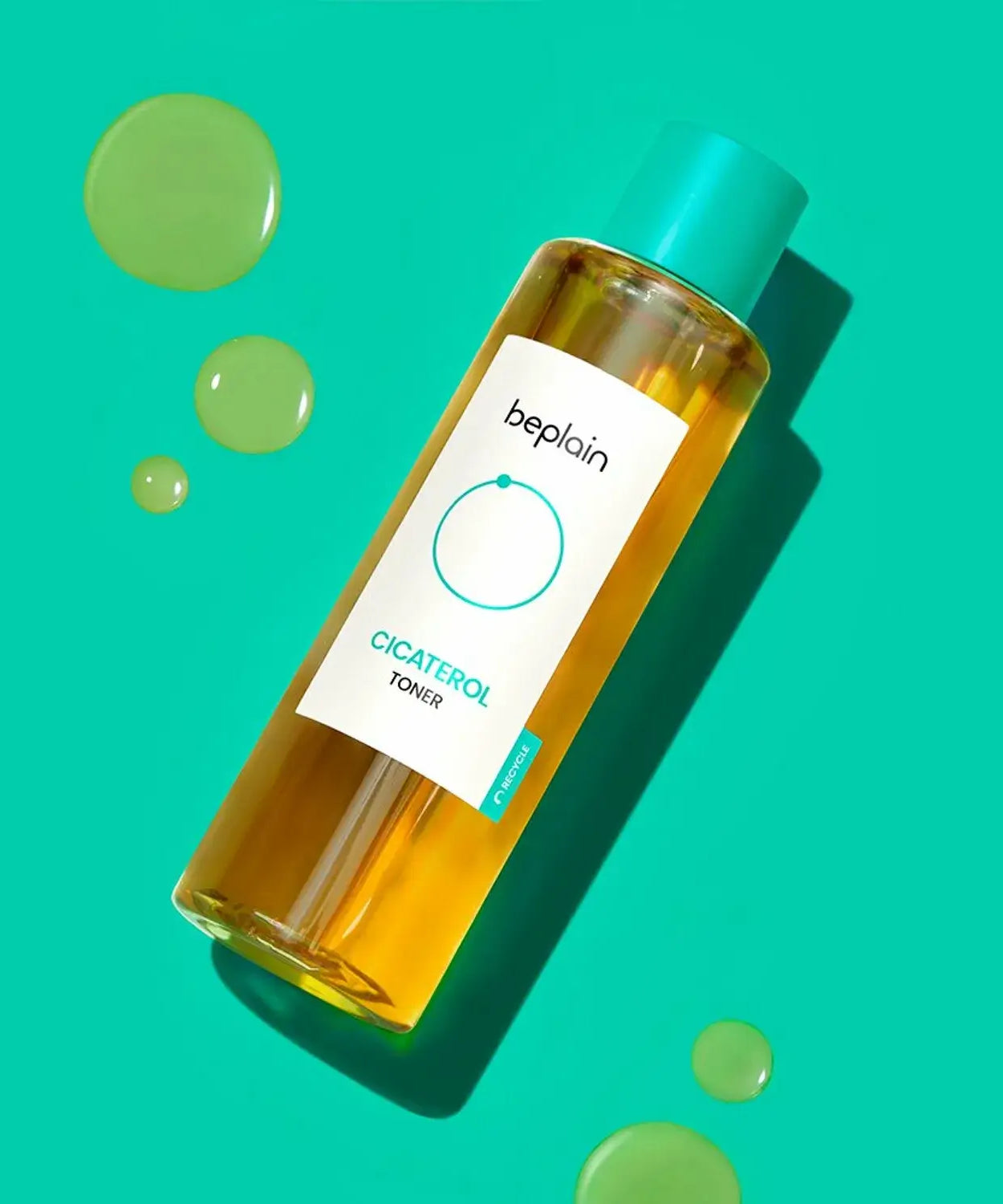 BEPLAIN Cicaterol Toner bottle on a turquoise background with liquid droplets