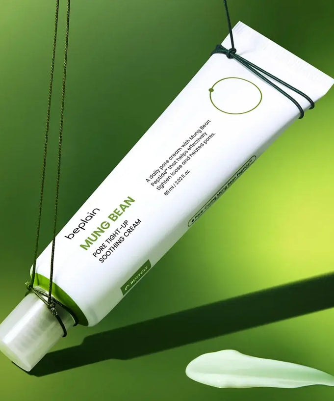 BEPLAIN Green Bean Pore Tightening Cream in a tube on a green background