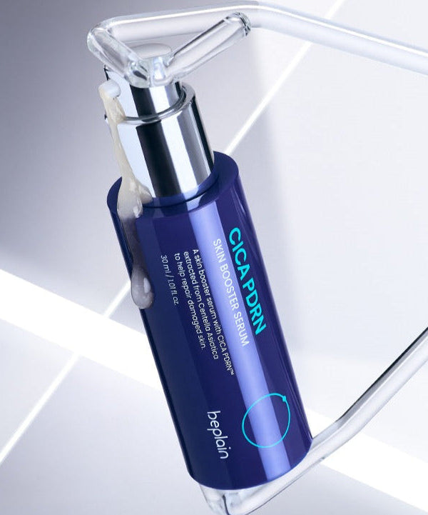 BEPLAIN Cica PDRN Skin Booster Serum 30ml bottle with sleek design on a reflective surface.