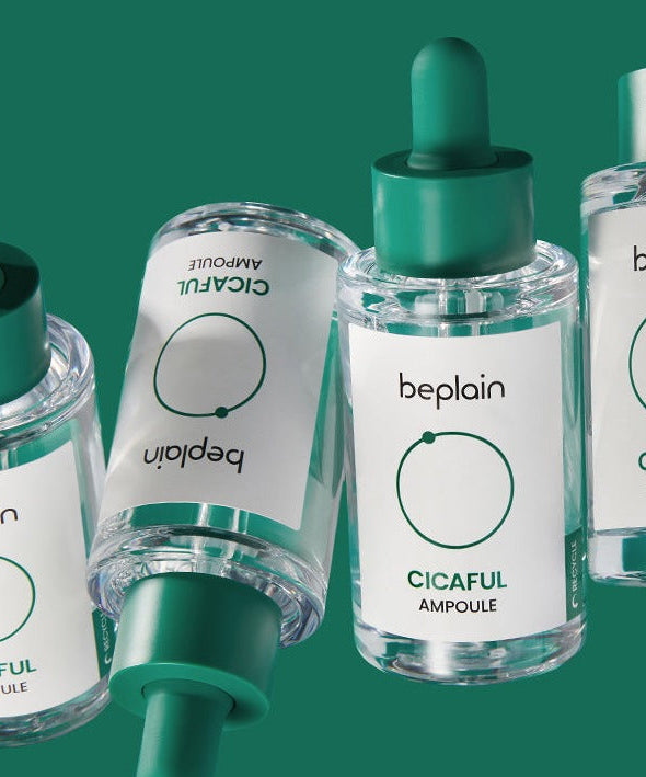 BEPLAIN Cicaful Ampoule bottles on a green background, showcasing skincare serum packaging design.