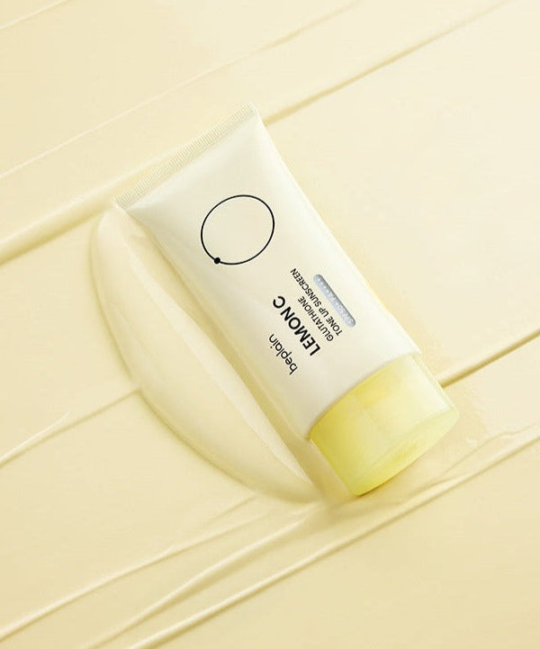 BEPLAIN Lemon Seed Glutathione Tone-up Sun Cream 50ml tube on creamy background